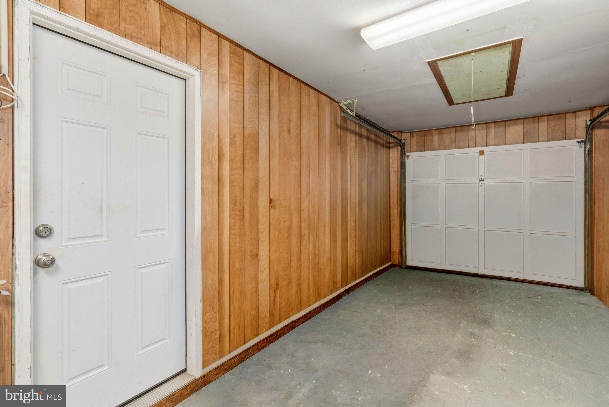 44 Quickset Road Levittown, PA 19057 - Photo 26 of 28 Spacious garage with wooden accents.