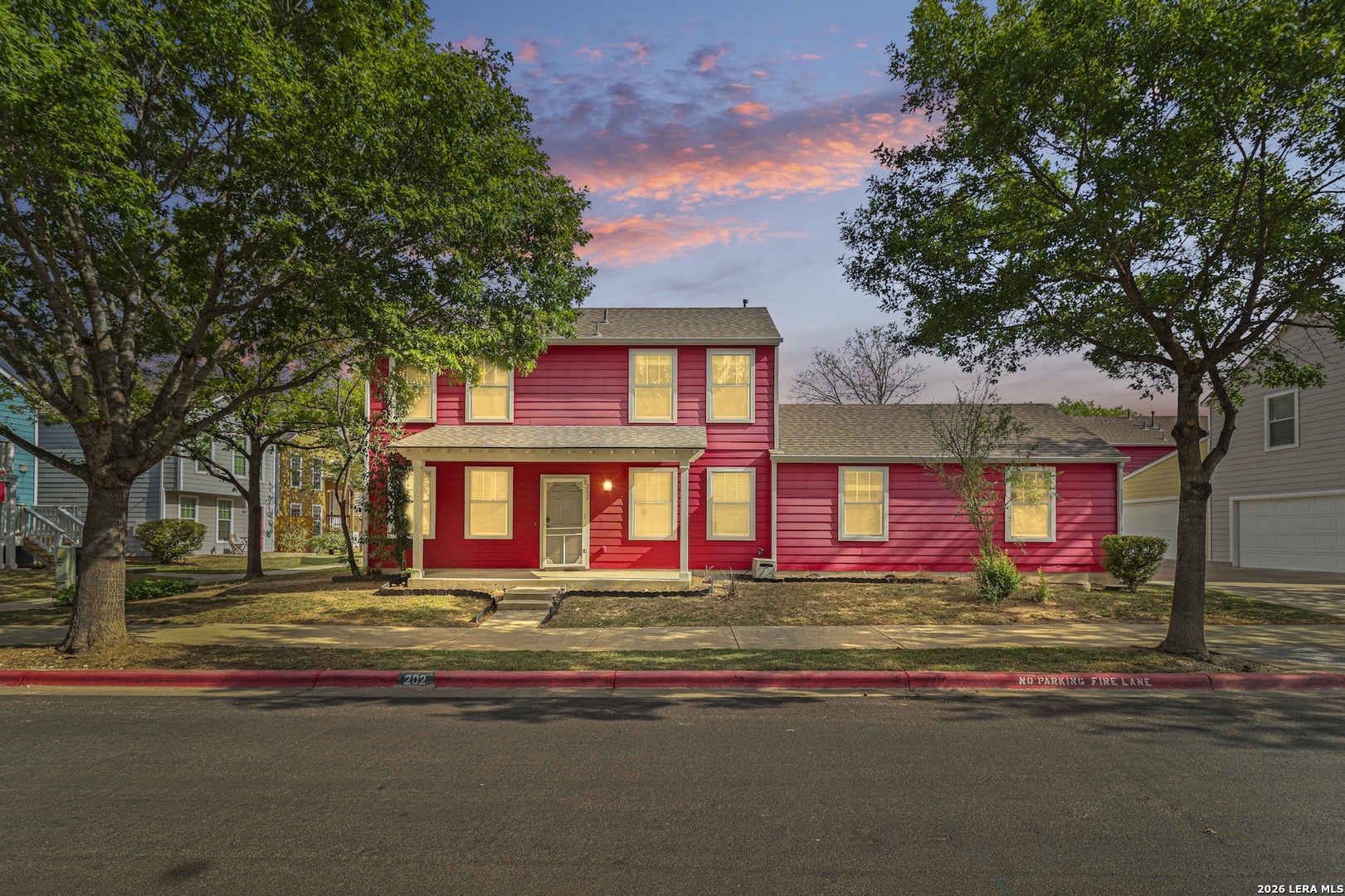 202 Trestle Tree San Marcos, TX 78666 - Photo 1 of 22 a front view of house with yard and trees around