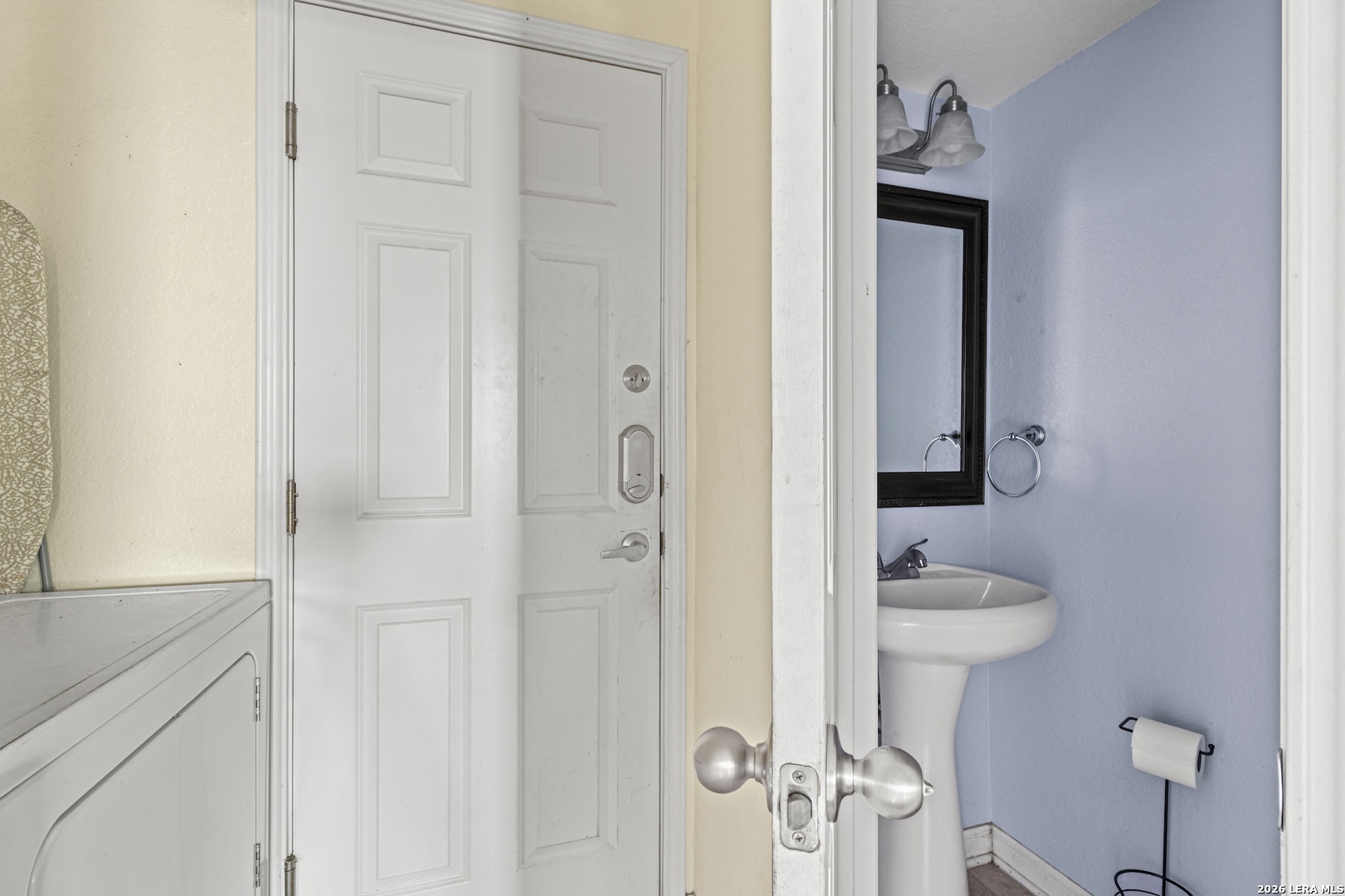 202 Trestle Tree San Marcos, TX 78666 - Photo 13 of 22 a bathroom with a sink and mirror