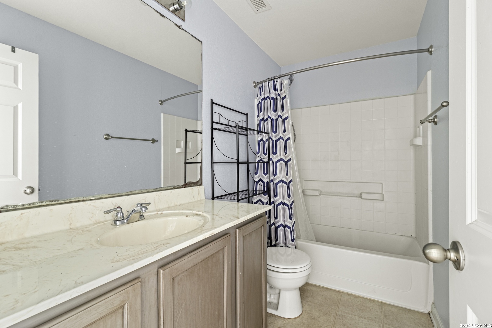 202 Trestle Tree San Marcos, TX 78666 - Photo 19 of 22 a bathroom with a sink a toilet and shower
