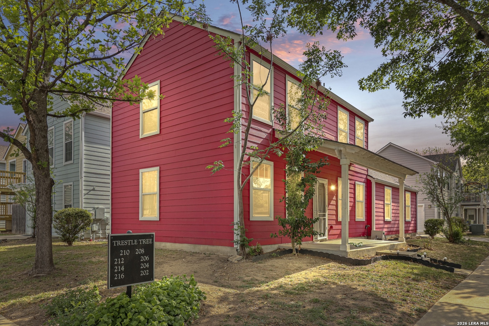 202 Trestle Tree San Marcos, TX 78666 - Photo 2 of 22 a view of a building with a yard