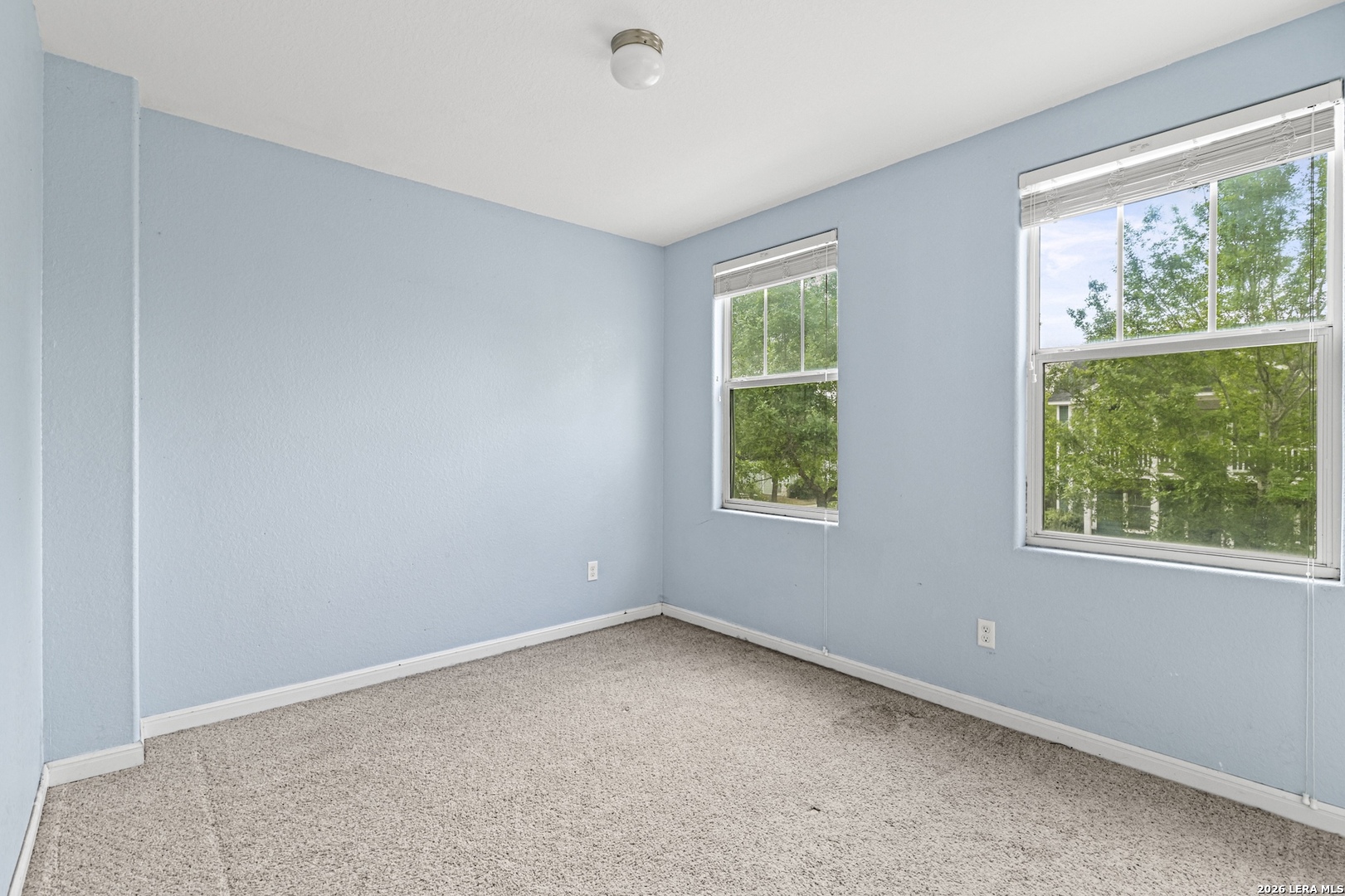 202 Trestle Tree San Marcos, TX 78666 - Photo 5 of 22 an empty room with windows