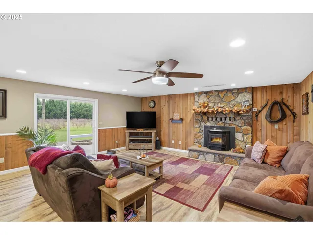 a bedroom with a large bed and a tv