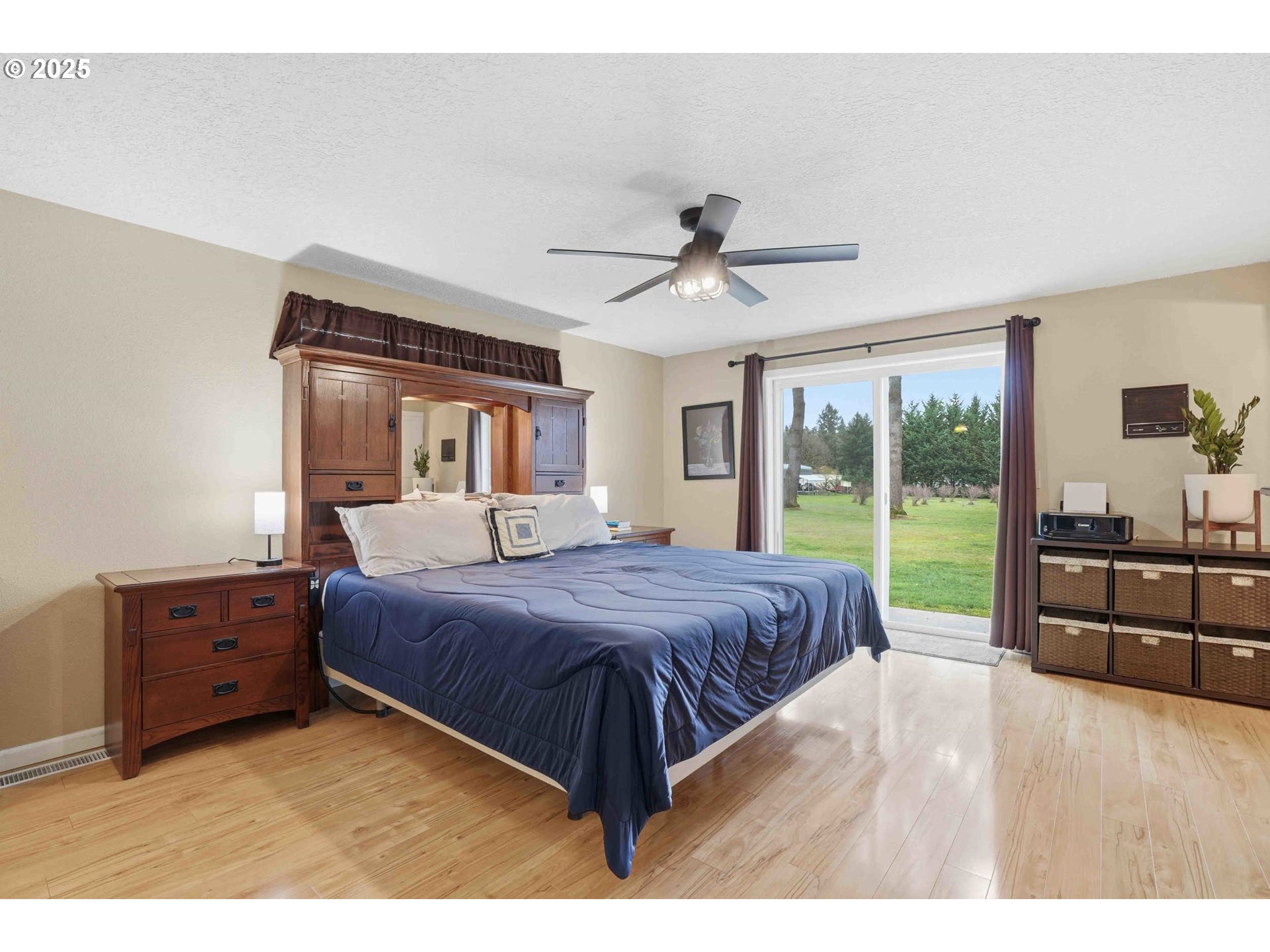 25511 Northeast 13th Street Camas, WA 98607 - Photo 16 of 36 a bed room with a bed and a television