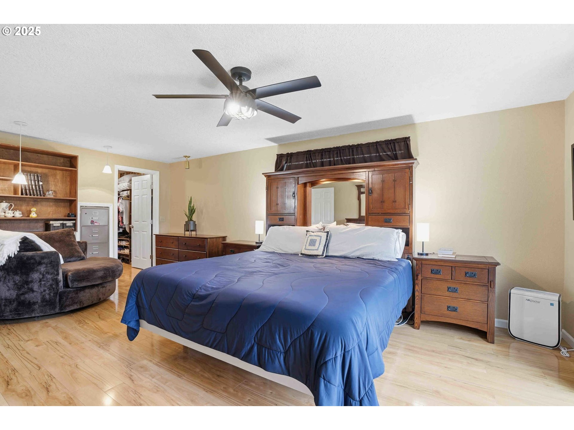25511 Northeast 13th Street Camas, WA 98607 - Photo 17 of 36 a bedroom with a bed window and couch