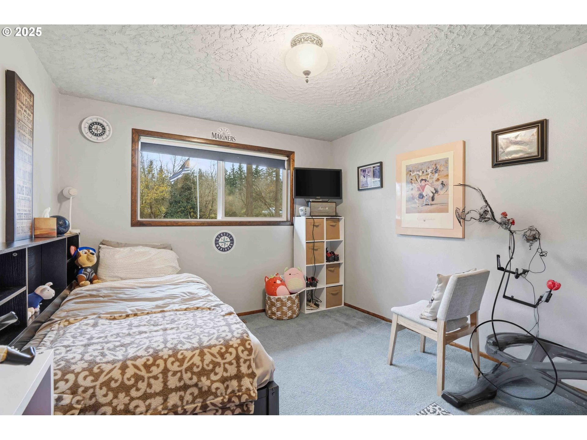 25511 Northeast 13th Street Camas, WA 98607 - Photo 21 of 36 a bedroom with a bed and wooden floor