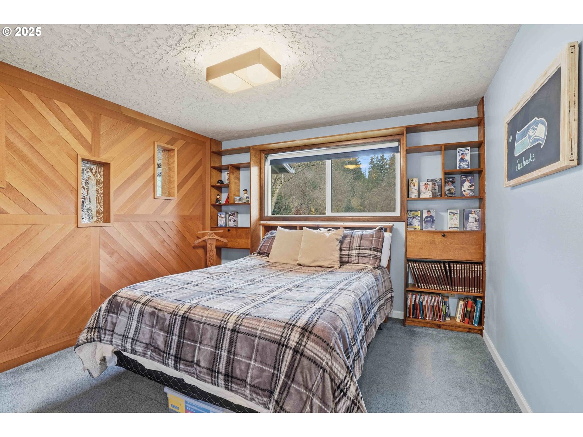 25511 Northeast 13th Street Camas, WA 98607 - Photo 23 of 36 a bedroom with a bed and a large window