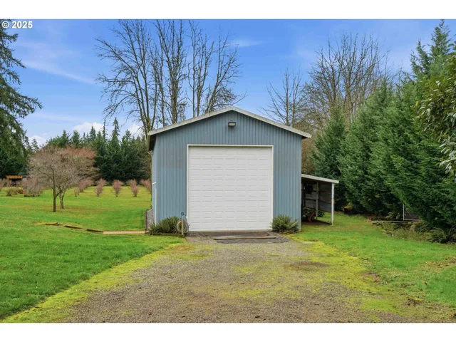 a backyard of a house with lots of green space