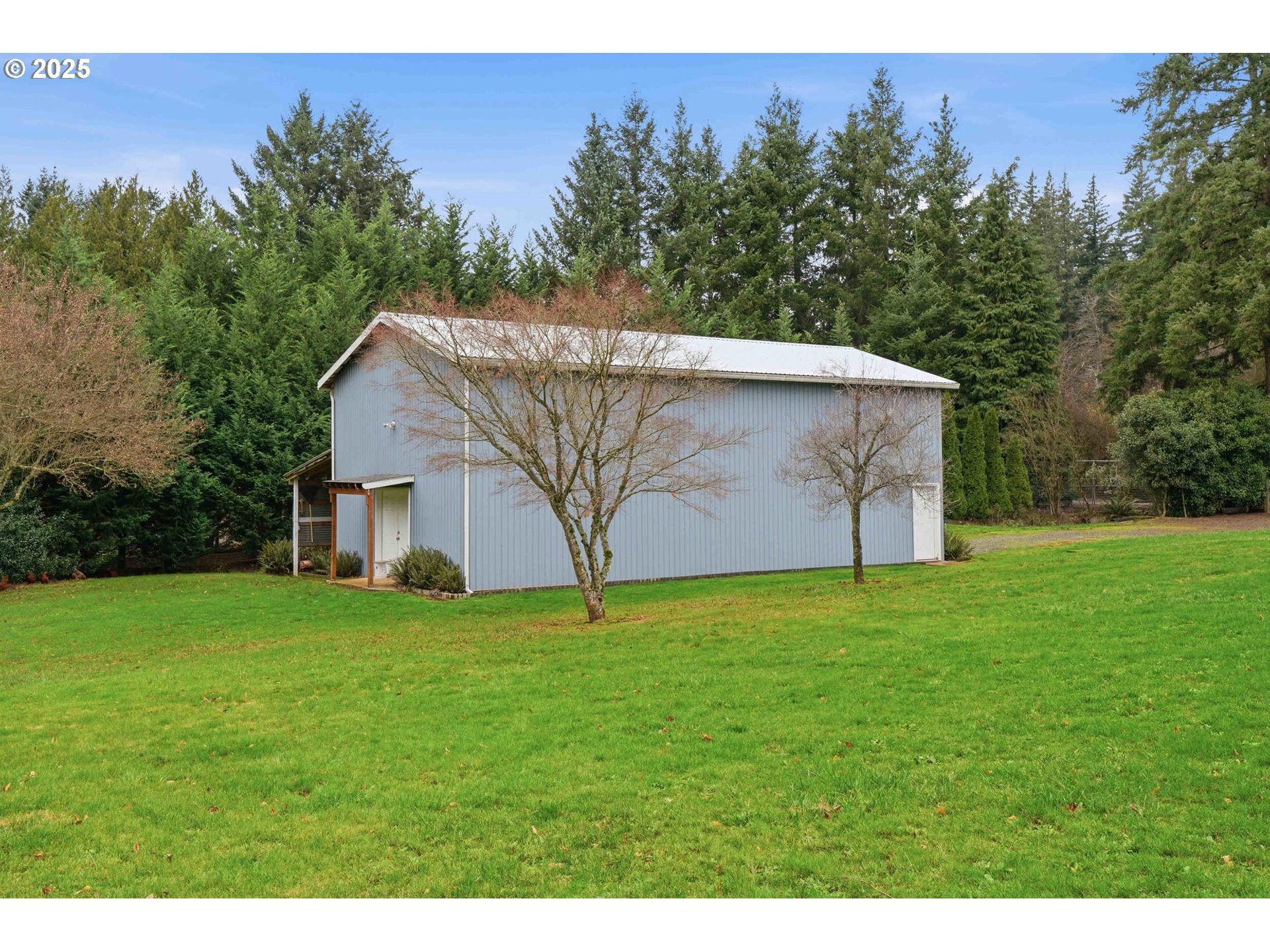 25511 Northeast 13th Street Camas, WA 98607 - Photo 33 of 36 a backyard of a house with lots of green space
