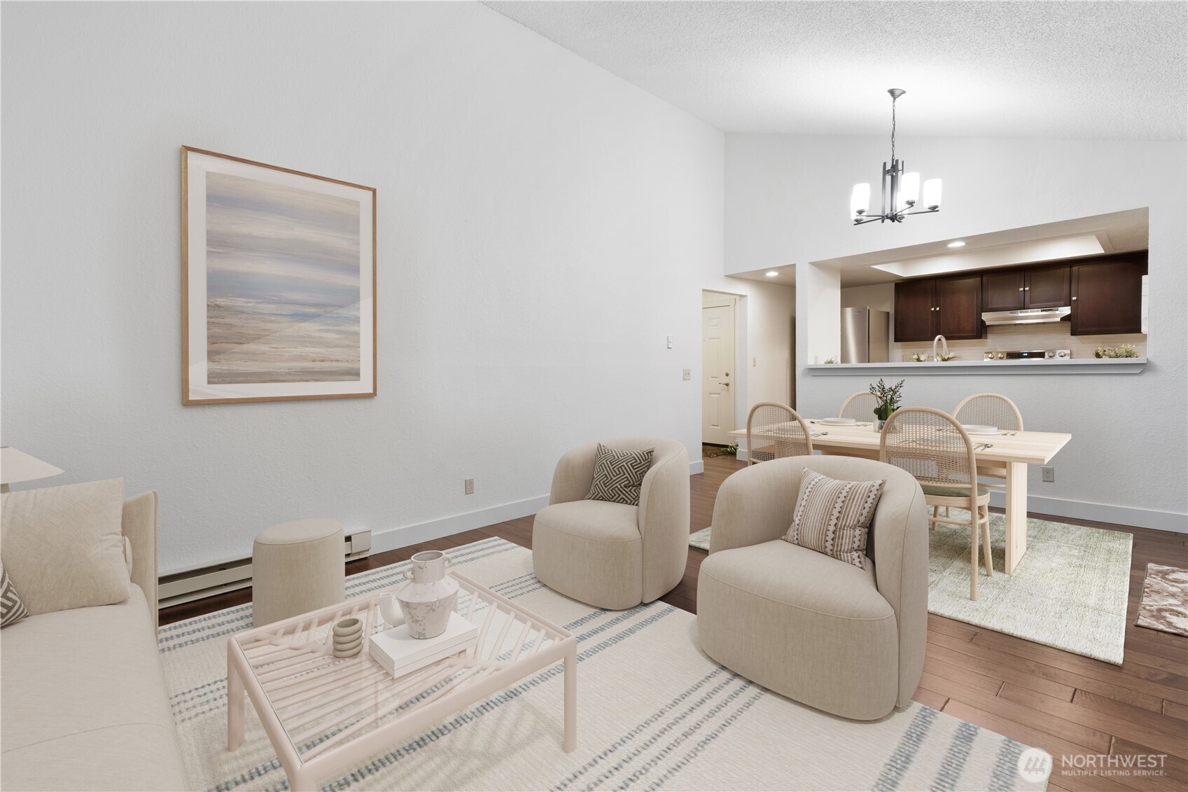 14401 Southeast Petrovitsky Road, Unit B209 Renton, WA 98058 - Photo 15 of 35 a living room with furniture a flat screen tv and kitchen view