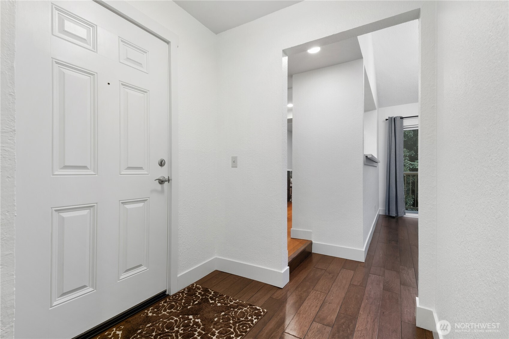 14401 Southeast Petrovitsky Road, Unit B209 Renton, WA 98058 - Photo 3 of 35 wooden floor in a gallery
