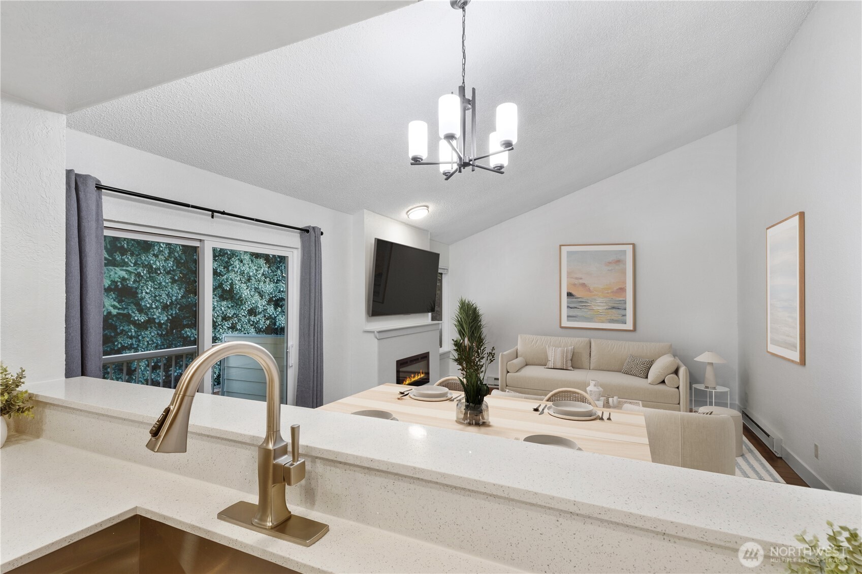 14401 Southeast Petrovitsky Road, Unit B209 Renton, WA 98058 - Photo 9 of 35 a very nice looking dining room with a large bed and a chandelier