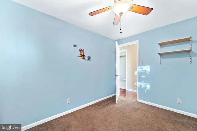 a bathroom with a tub and shower