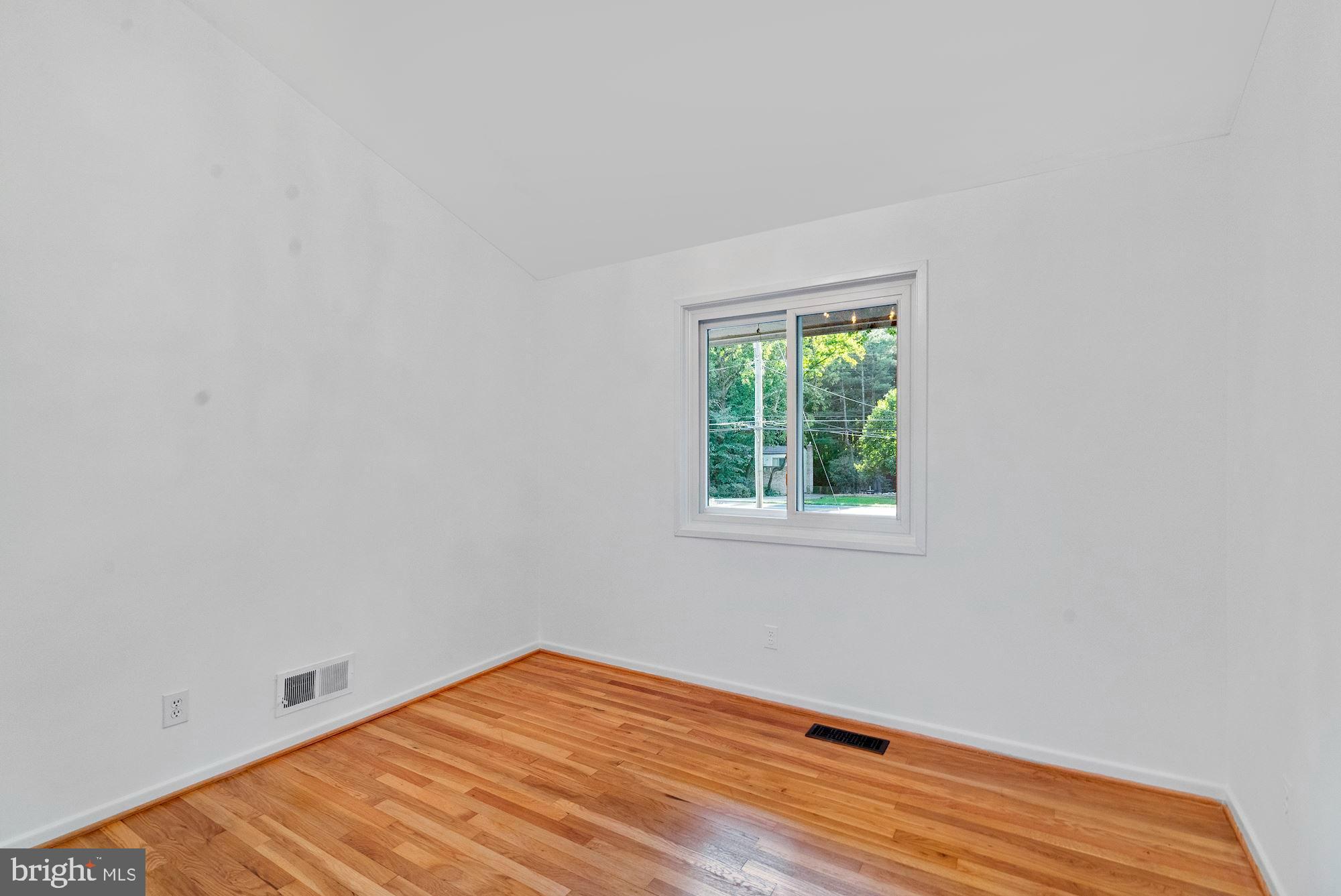 6917 Persimmon Tree Road Bethesda, MD 20817 - Photo 25 of 41 Upper Level Secondary Bedroom 1