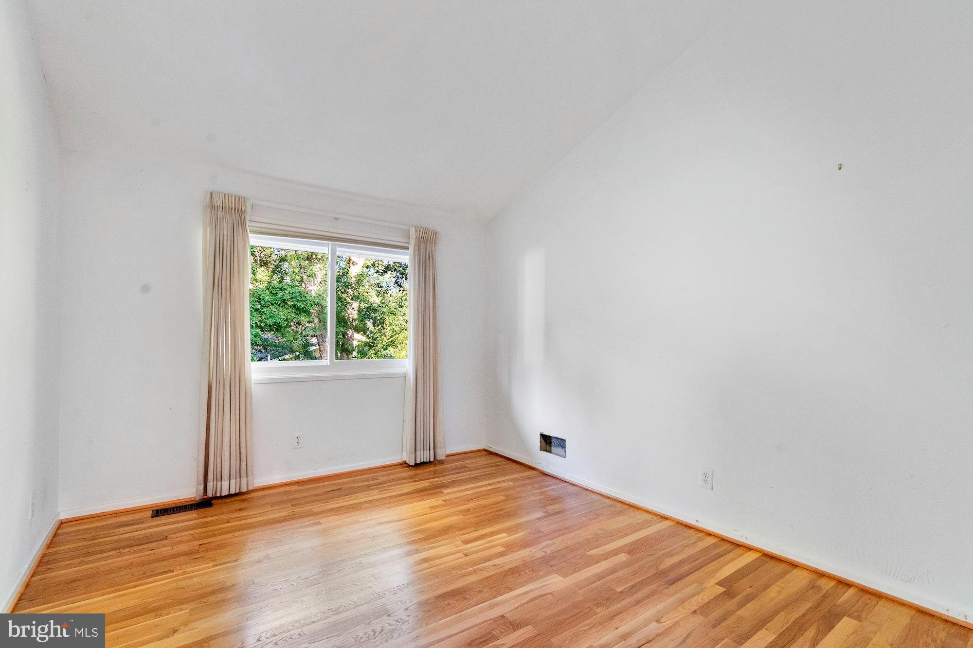 6917 Persimmon Tree Road Bethesda, MD 20817 - Photo 26 of 41 Upper Level Secondary Bedroom 2