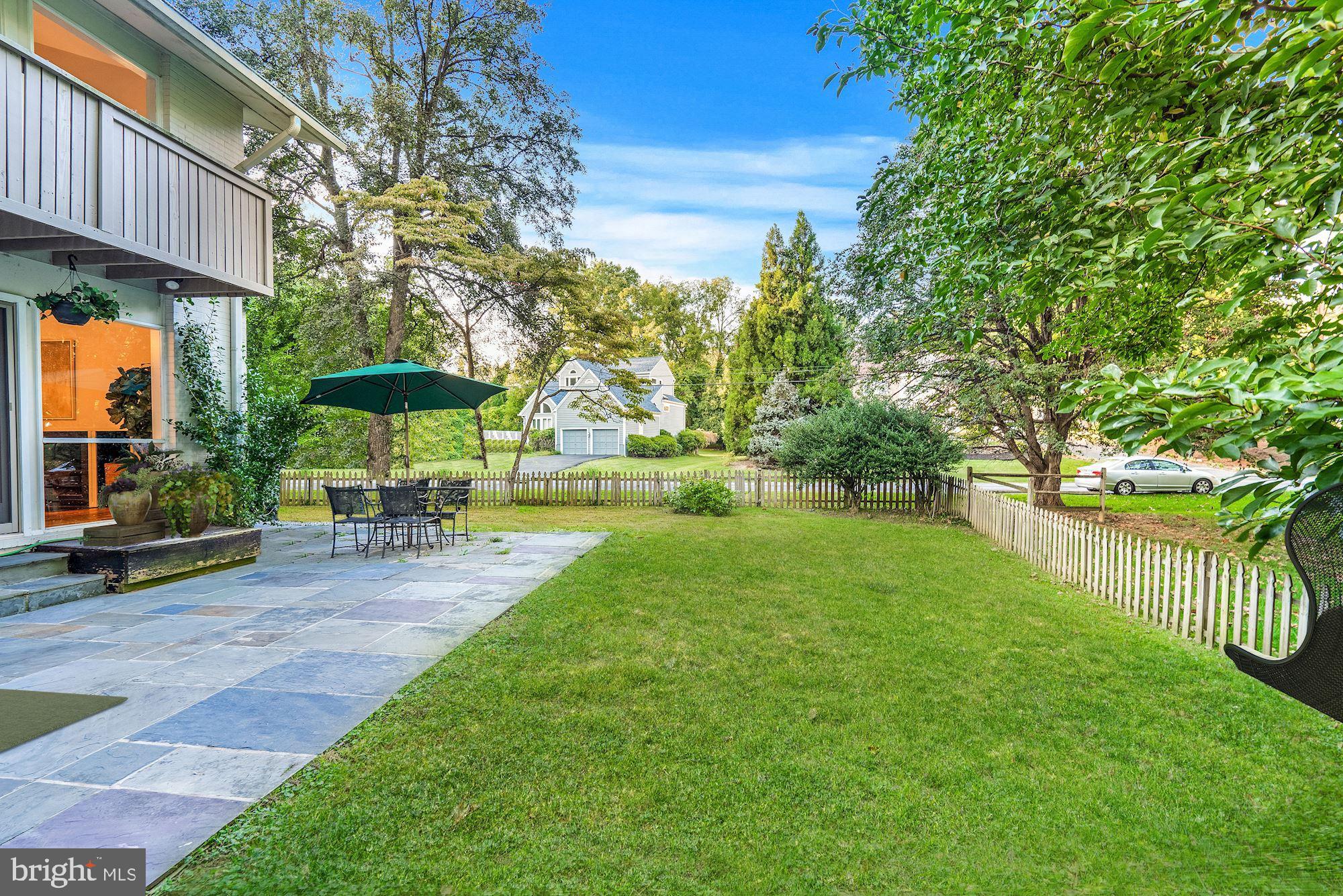 6917 Persimmon Tree Road Bethesda, MD 20817 - Photo 35 of 41 Private Backyard Patio with Custom Hardscaping