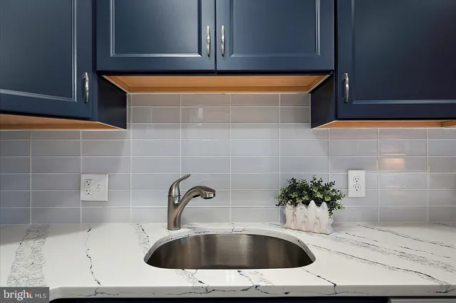 a bathroom with a sink and bathtub