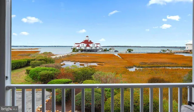 a view of a balcony with an ocean