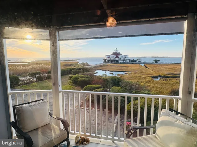 a view of a chair and table in balcony