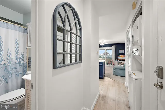 a view of bathroom with a toilet and a shower