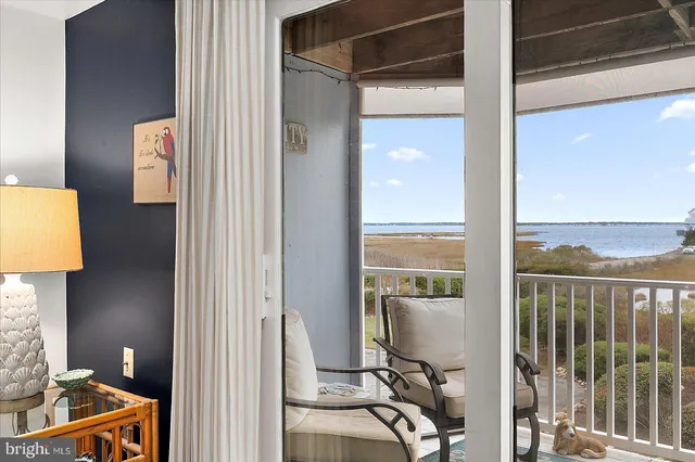 a view of a bathroom with a sink and a window