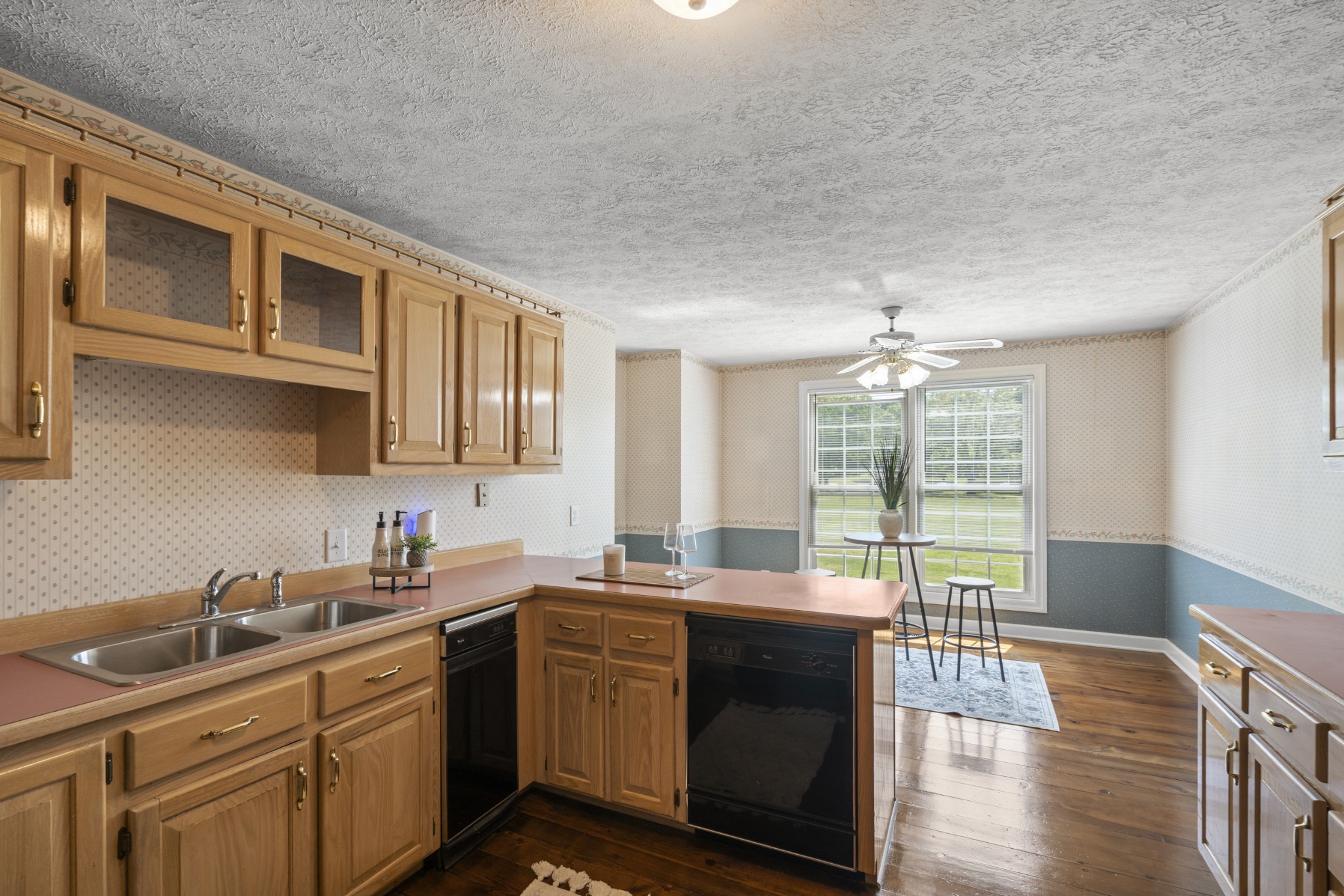 1010 State Highway 48 Dickson, TN 37055 - Photo 15 of 59 a kitchen with stainless steel appliances granite countertop a sink stove and cabinets