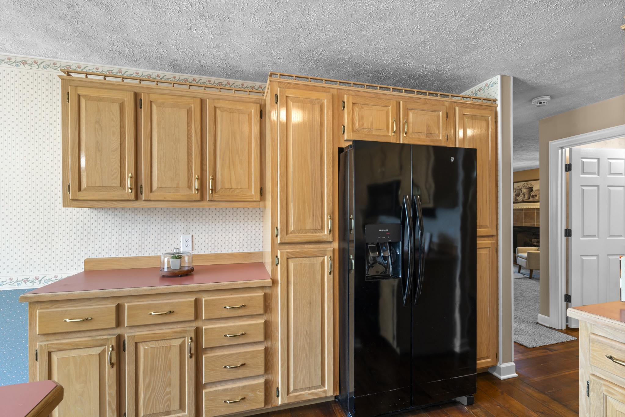 1010 State Highway 48 Dickson, TN 37055 - Photo 18 of 59 a kitchen with stainless steel appliances a refrigerator and cabinets