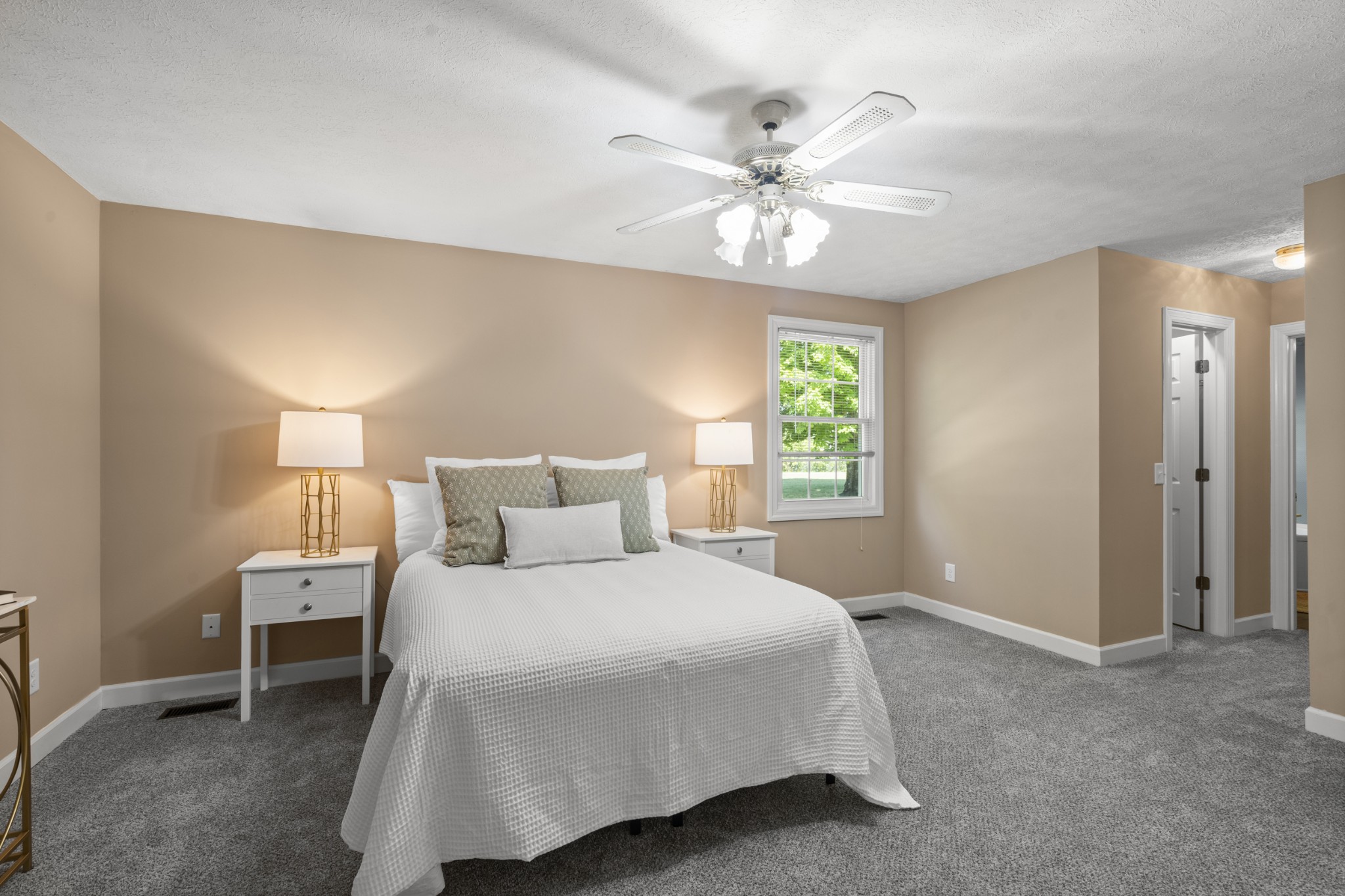 1010 State Highway 48 Dickson, TN 37055 - Photo 23 of 59 a bedroom with a large bed chandelier and a window