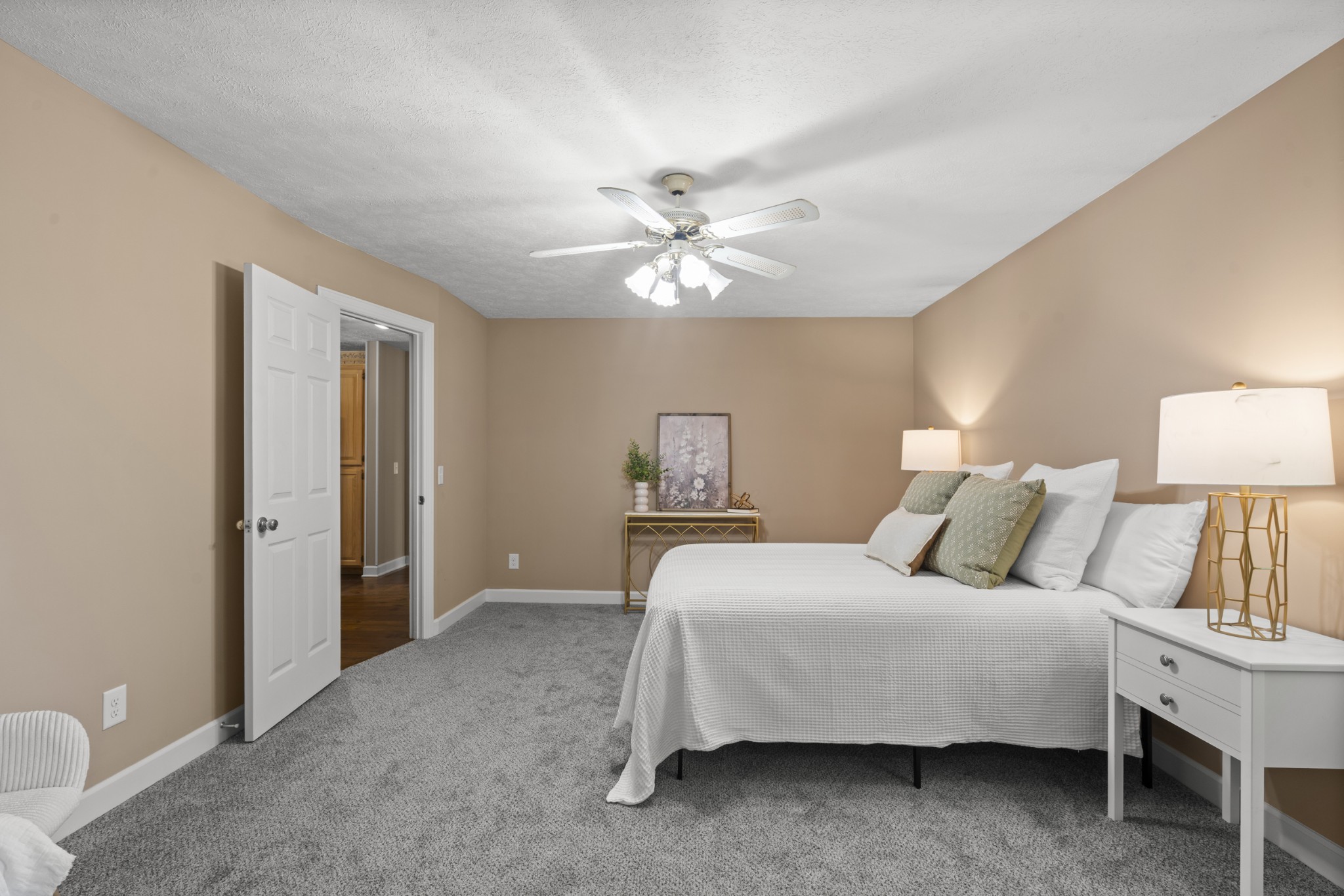 1010 State Highway 48 Dickson, TN 37055 - Photo 24 of 59 a bedroom with a bed and a ceiling fan
