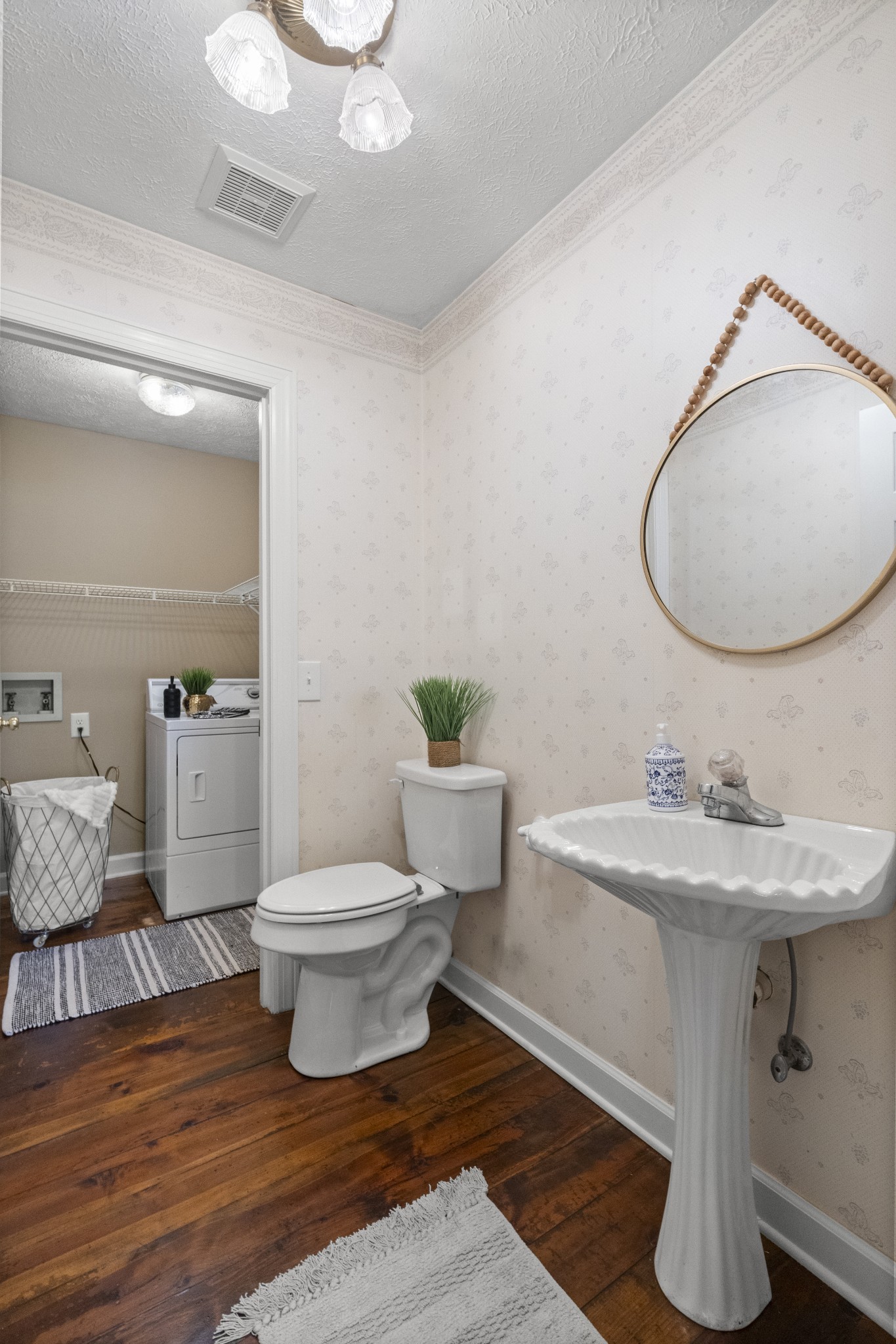 1010 State Highway 48 Dickson, TN 37055 - Photo 35 of 59 a bathroom with a toilet a sink and mirror