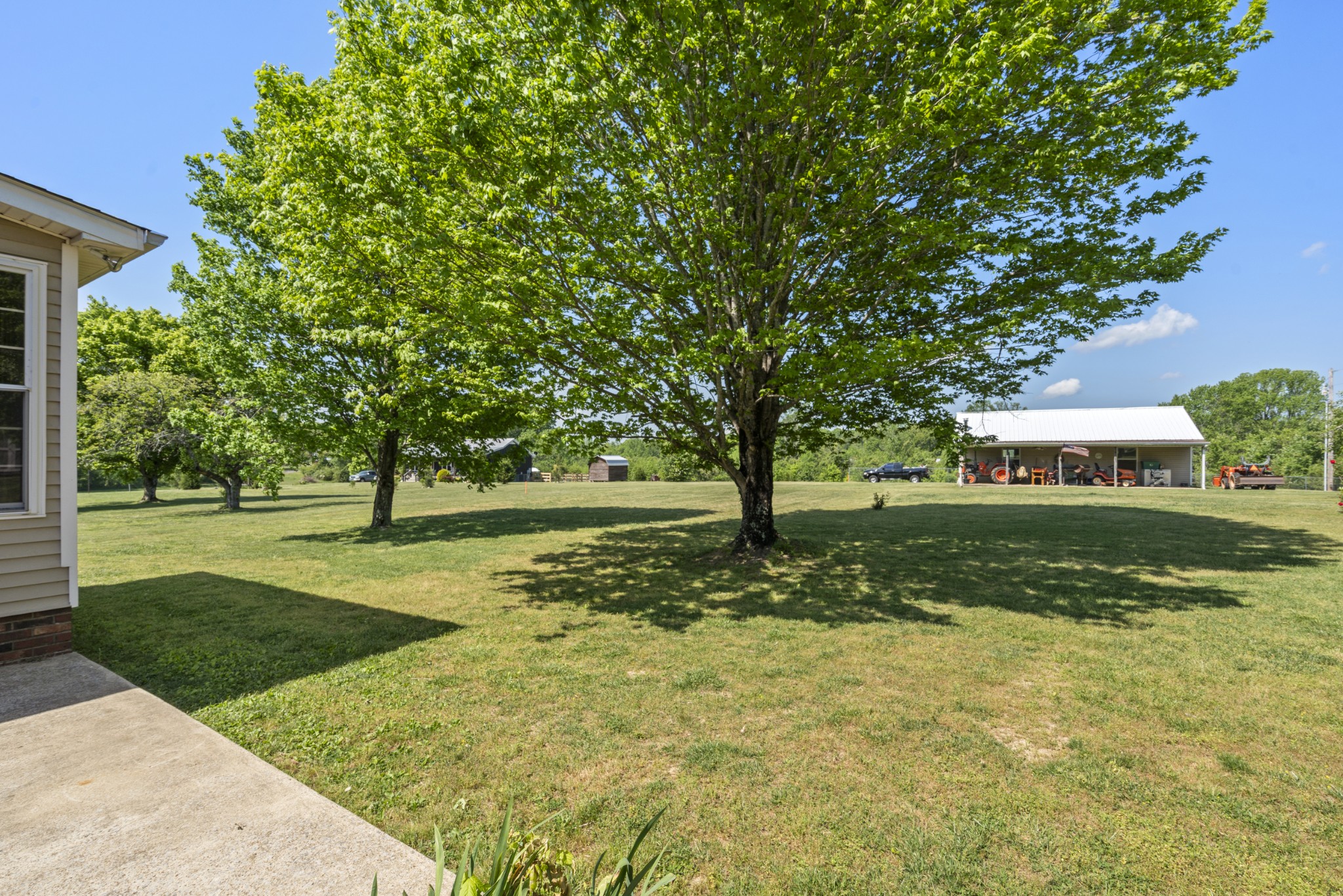 1010 State Highway 48 Dickson, TN 37055 - Photo 41 of 59 a view of a yard with plants and trees