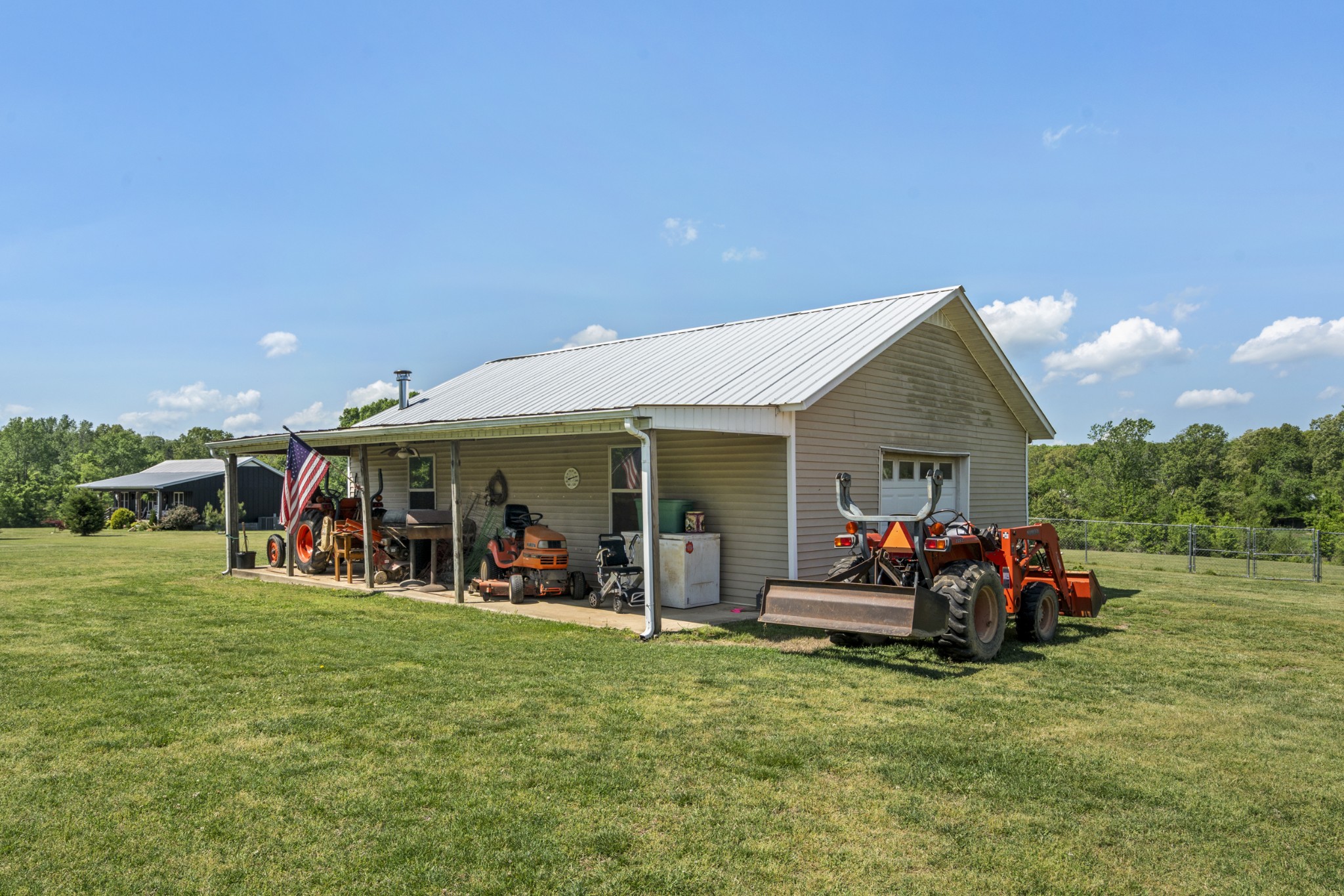 1010 State Highway 48 Dickson, TN 37055 - Photo 46 of 59 a front view of a house with a garden and outdoor seating