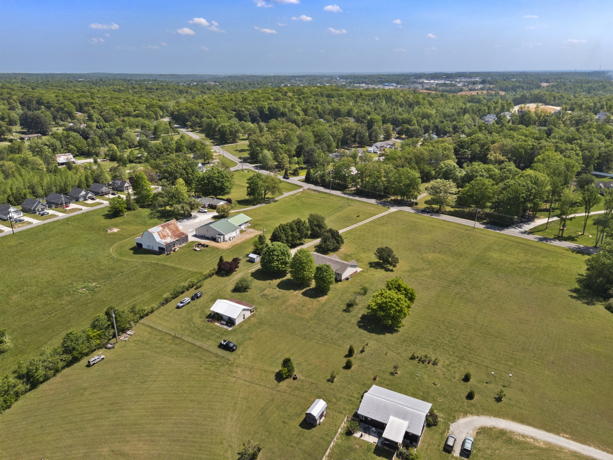 1010 State Highway 48 Dickson, TN 37055 - Photo 53 of 59 an aerial view of residential houses with outdoor space