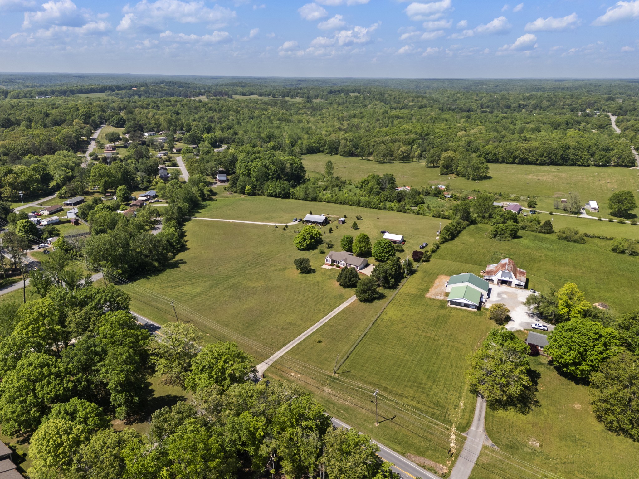 1010 State Highway 48 Dickson, TN 37055 - Photo 56 of 59 an aerial view of a houses with outdoor space