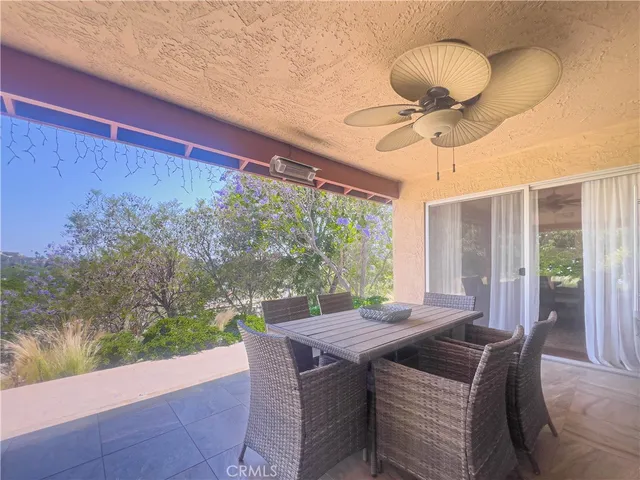 a view of patio with a yard