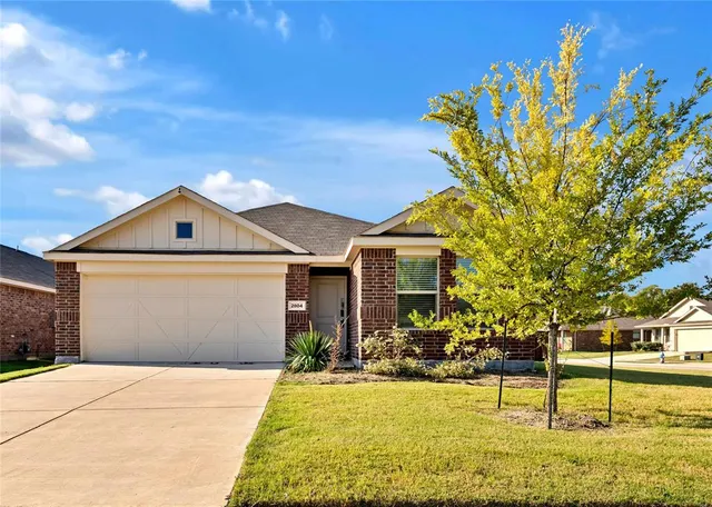 a house view with a swimming pool