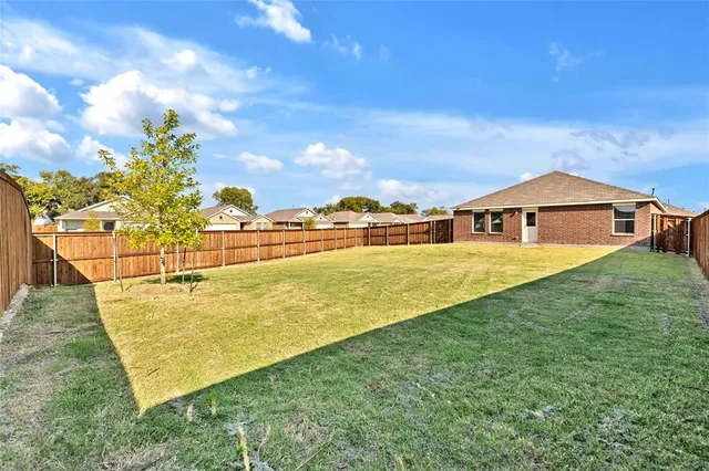 a view of a swimming pool with an ocean view