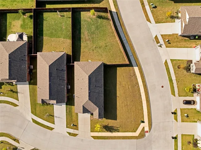 a view of living room with furniture and floor to ceiling window