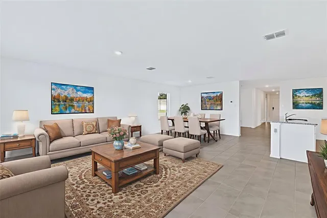 a living room with furniture and a couch