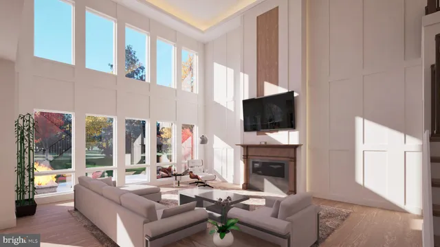 a living room with fireplace furniture and a flat screen tv