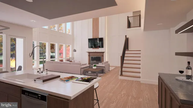 a view of kitchen island with stainless steel appliances granite countertop a stove and a sink