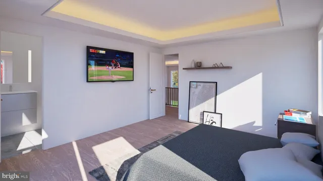 a bedroom with a bed and a painting on the wall