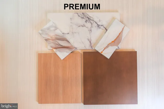 a utility room with a white wall