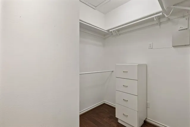 a view of an empty walk in closet