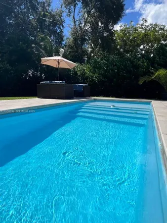 a view of outdoor space yard and swimming pool