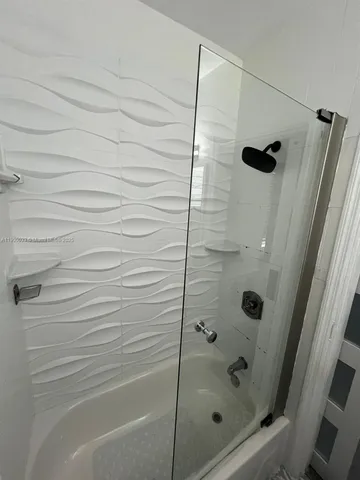 a view of swimming pool with lounge chair