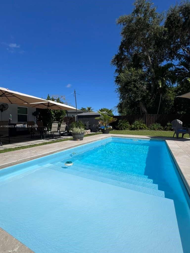 1430 Northeast 149th Street Miami, FL 33161 - Photo 4 of 51 a view of outdoor space yard and swimming pool