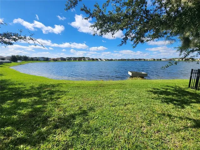 a view of a lake from a yard