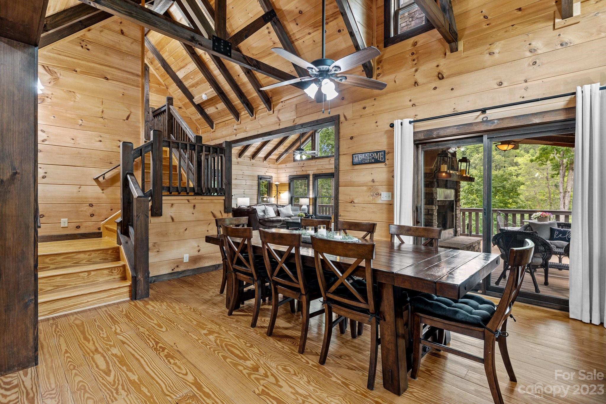 7478 Bankhead Road Denver, NC 28037 - Photo 11 of 48 a view of a dining room with furniture window and wooden floor