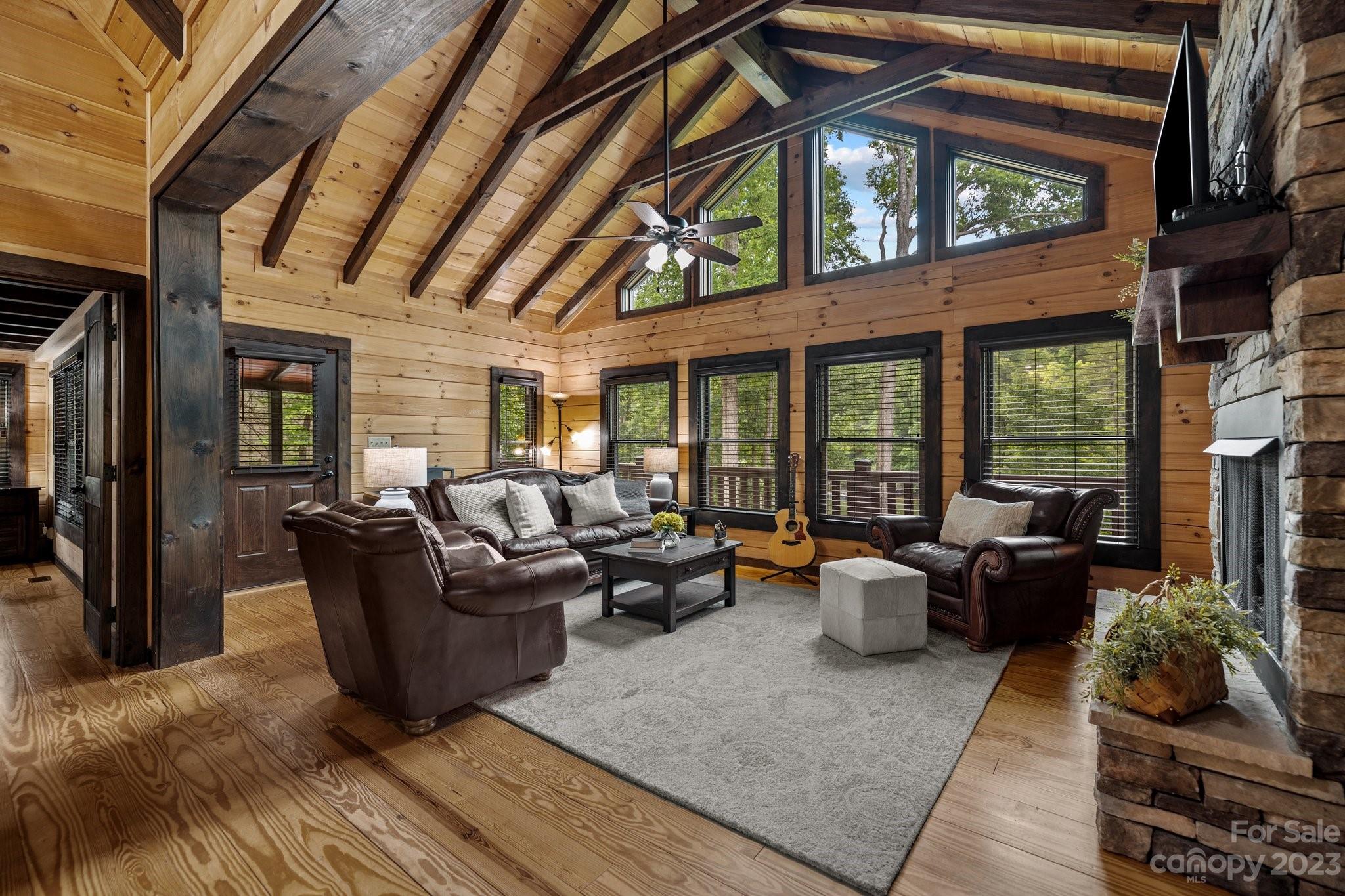 7478 Bankhead Road Denver, NC 28037 - Photo 13 of 48 a living room with furniture fireplace and flat screen tv